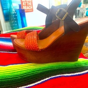 Orange brown Wedges . Orange braided strap and brown stamp 7 1/2 wedge